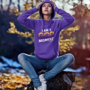Hoodie Mockup of A Woman Sitting on A Tree Stump